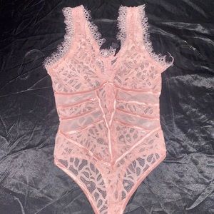 Lace bodysuit. Brand New.